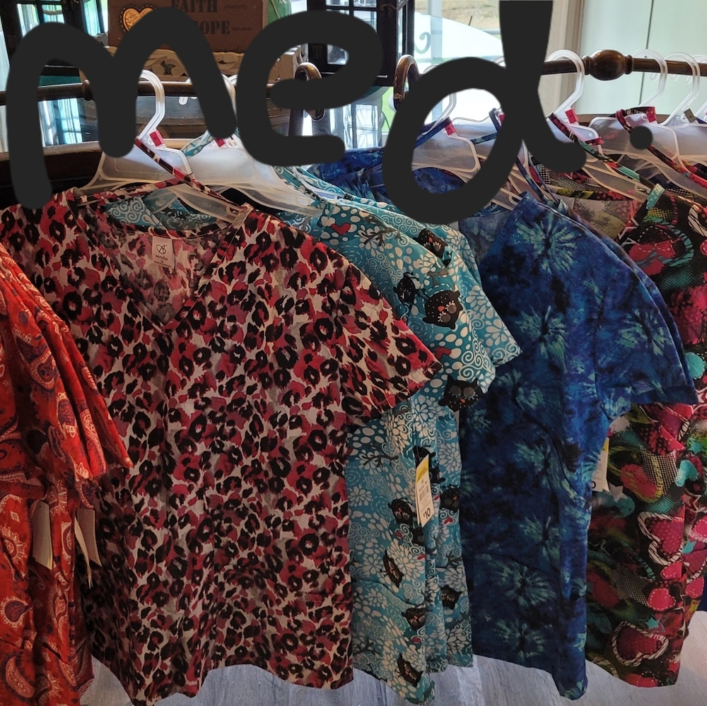 Read!!!! NEW SCRUB TOPS WITH TAGS SMALLS AND MEDIUMS. $8 EACH.